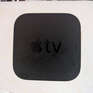 Apple TV Box with Silver and Black Accents